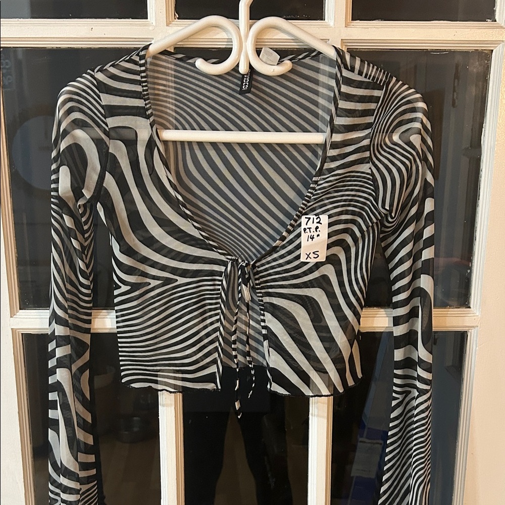 713.  Stylish Black and White Striped Women's Top